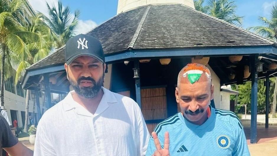 Superfan Sudhir poses with Rohit, T20 World Cup trophy