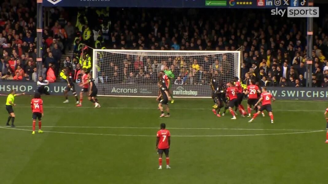 Jordan Clarke scores Luton Towns first goal against Watford from an untidy corner kick.”