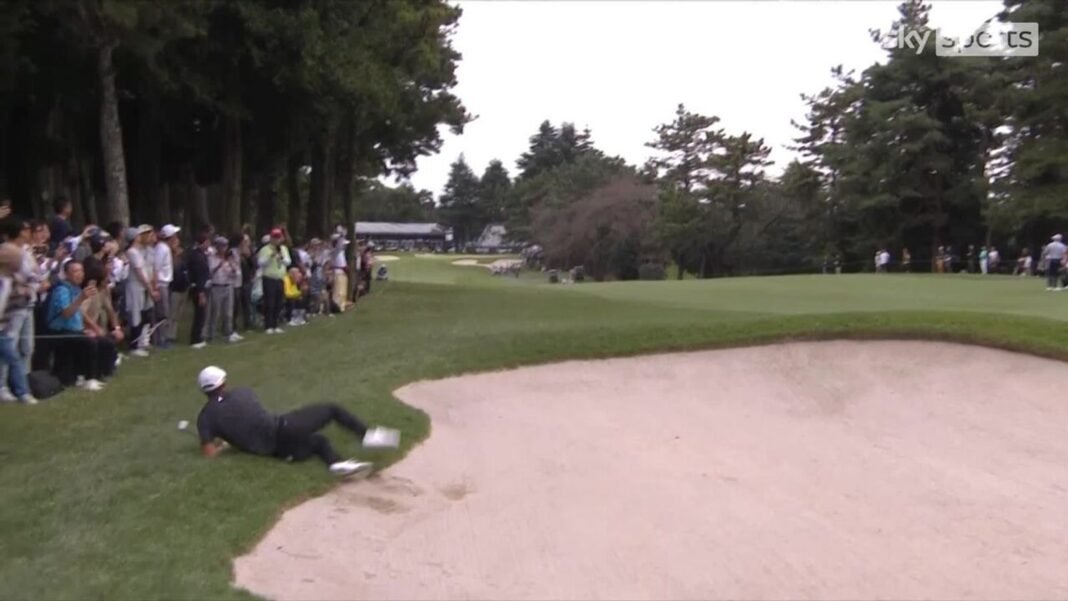 Collin Morikawa brilliantly escapes bunker on the 18th hole then falls over at Zozo…