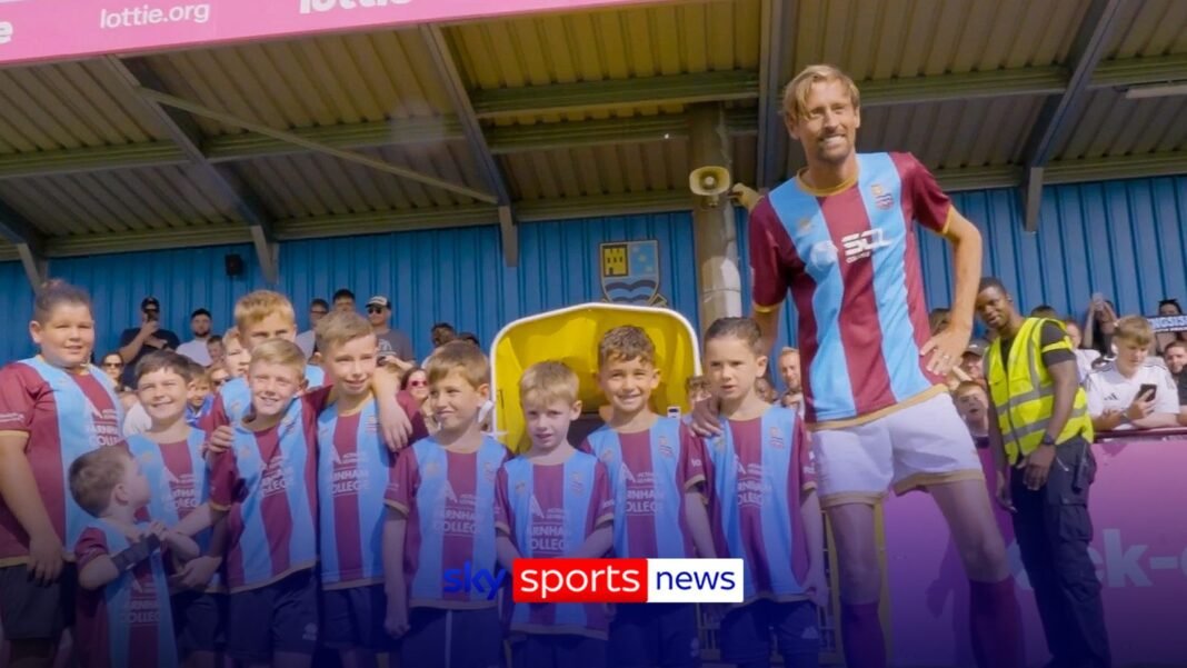 Peter Crouch returns to the pitch… as Farnham mascot!